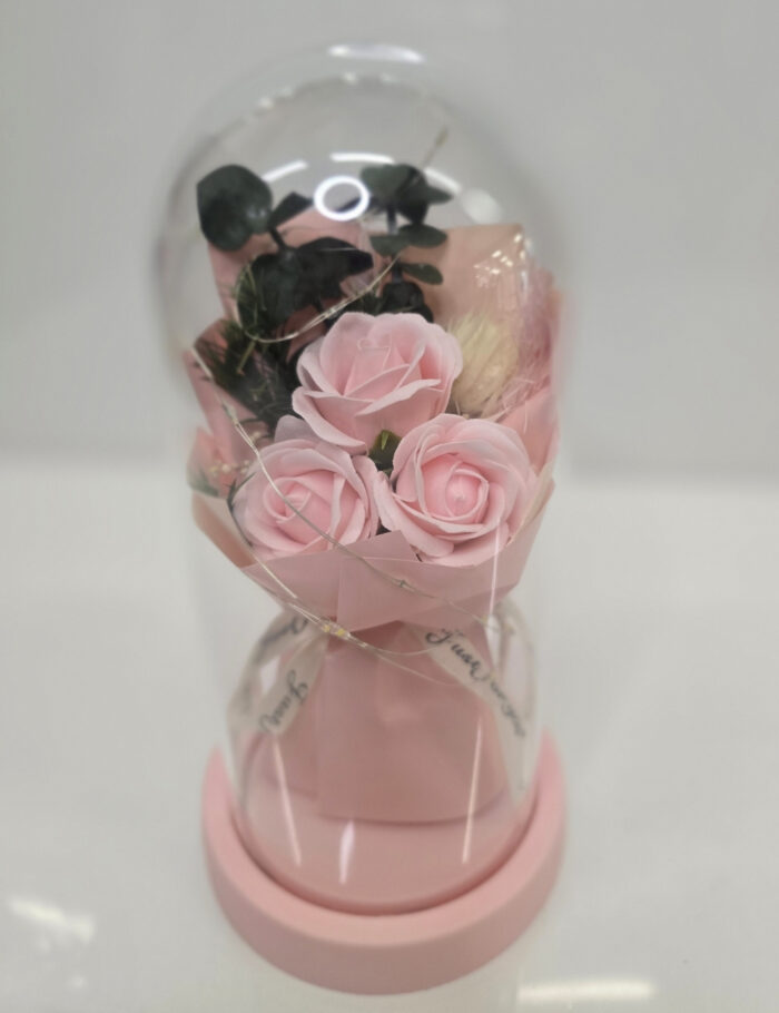 Glasglocke mit Pink-Rosen